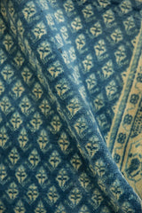 Distressed sapphire blue Mir Sarouk rug, ivory floral botehs, and soft, even wear.