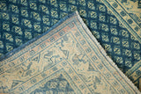 Worn sapphire blue floral botehs on Mir Sarouk runner pile and reverse hand-knotted foundation.
