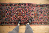 Vintage Dargezine runner: dusty rose field, repeating floral bouquets, thousand flower motif, and dark border.