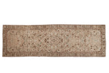 Distressed Hamadan runner, muted floral design in earthy browns and subtle pastels, 3'1