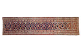 Distressed vintage Kurd runner rug with navy blue, fuchsia, orange geometric abrashes.