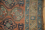 Antique Northwest Persian runner detail: unusual covered field with geometric guls, sky blue border.