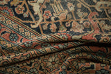 Detail of the antique Khorassan rug, highlighting dragon arabesques and vinery with storied texture.