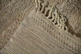 Vintage Moroccan Carpet showing plush natural beige pile and geometric woven backing.