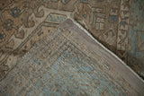 Karaja carpet corner, distressed geometric pattern, exposed foundation and intact side selvage.
