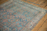 Distressed vintage Hamadan rug, geometric Herati design and soft blue, rust tones.