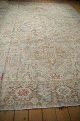 Distressed vintage Karaja with ivory, coffee, blue serrated palmette and geometric motifs.
