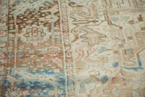 Close-up of distressed vintage Karaja carpet, showing abrased geometric patterns and faint foundation.
