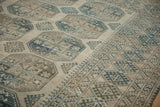 Evenly worn low pile showing the knot heads of a vintage Ersari carpet's geometric design.