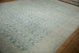 Distressed Persian Mahal rug corner with a pale sapphire blue turtle Samovar border.
