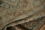 A soft fold reveals the time-softened patina and distressed low pile of a vintage Kayseri rug.