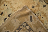 Corner view of a vintage Kars carpet showing the hand-knotted back and secured side cord.