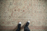 Mostly even wear across the low pile of a vintage Anatolian carpet with geometric Samovar motifs.