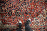 Detailed corner spandrel of a vintage Persian Ahar carpet with serrated leaves in red and navy.