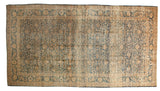 Distressed vintage Meshed carpet, tea washed, with muted blue and gold floral palmette design. 10'4