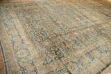 Distressed vintage tea washed Meshed carpet, soft with blue and gold floral palmettes.