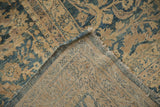 Hand-knotted foundation and distressed pile texture of a vintage Meshed carpet, featuring faded dusty blue.