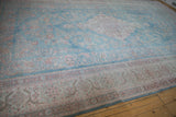 Vintage Distressed Meshed carpet showing dynamic abrashes and geometric arabesque border.
