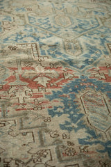 Distressed vintage Mehrivan rug pile, highlighting abrashed pale blue, terracotta geometric motifs.