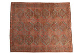 Antique distressed Ersari carpet, faded raspberry red with repeating guls and serrated border.