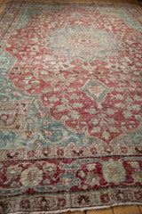 Classic Samovar dragon motif border on distressed vintage Khoy carpet, raspberry red, dusty teal.