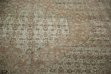 Even wear across the knot heads of a fine Tabriz carpet with copper and sand Herati motifs.