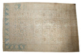 Vintage Distressed Tabriz Carpet, allover botanical and animal motifs in muted ivory and blue.