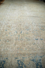 Distressed vintage Tabriz carpet, traditional curvilinear floral and vine motifs, blue, ivory.