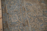 Distressed Indian Ahar rug, showcasing Souf weaving's textured dusty blue and beige patterns.