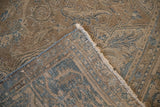 Folded Indian Ahar rug corner, showing blue and beige Souf weaving's varied textures.