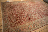 Vintage Heriz carpet featuring scrolled leaves, Herati Turtle Samovar border with softened tones.