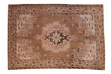 Vintage Distressed Kars carpet, central medallion and floral border, faded coffee, mauve, silver.