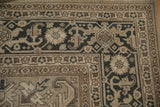 Distressed Sparta carpet border, showing dark beige and charcoal Turtle Samovar motifs.