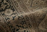 Distressed Sparta rug texture with even wear, revealing light beige and muted dark patterns.