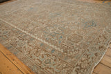 Distressed Heriz rug, Karaja stylized panels and floral motifs in soft brown, ivory, powder blue.