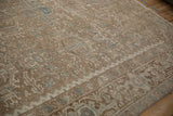 Evenly worn Karaja stylized panels in pale coffee brown, ivory, and powder blue.