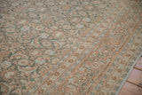 Angled view of the Herati field and Samovar Turtle border in terracotta, powder blue, and silver.