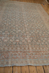 Distressed Tabriz carpet corner showing the Samovar Turtle border and allover Herati pattern.