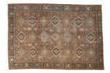 Vintage fine Heriz carpet with repeating Karaja-style medallions in coffee brown, dusty blue, and pale celadon green.