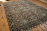 Low angle perspective of a vintage Heriz carpet showing its allover geometric pattern and even, low pile.