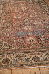 Mahal rug corner with intricate floral Darus pattern, dusty rose field, intact selvage.