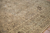 Time-softened low pile and even wear on a distressed Tabriz showing floral arabesque patterns.