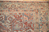 Detail of the Samovar Turtle border showing the even wear and knot heads of the vintage Heriz carpet.