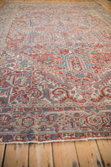 Angled view of the Samovar Turtle border and time-softened texture of a Persian Heriz rug.