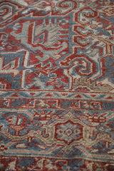 Close view of the Samovar Turtle motif and textured pile on a vintage Heriz carpet.