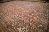 Distressed geometric floral blossoms and Samovar Turtle border on a vintage Mehrivan carpet.