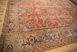 Distressed Vintage Mehrivan carpet border detail, showing Turtle Samovar motif in brick red and silver.