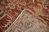 Distressed Mehrivan rug fold, revealing germinating boteh, abrashes, and a Turtle Samovar border in brick red.