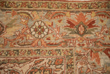 Hand-knotted pile of a vintage Ahar carpet showing floral motifs with serrated leaves in silver and dusty gold.