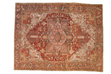 Vintage Distressed Heriz carpet, quatrefoil medallion, brick red, dusty gold, and charcoal geometry.